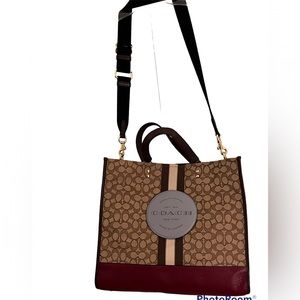 NEW Coach Tote Bag with Coach Symbol on the front. 4 compartments inside.